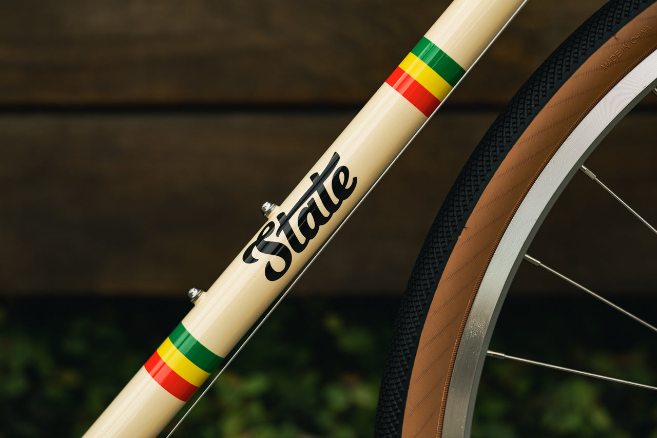 State Bicycle Co. x Bob Marley - 4130 Road+ - Rasta Stripe Tan